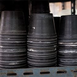 A few stacks of plastic plant pots