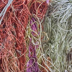 Lots of string tangled up together in a pile