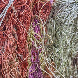 Lots of string tangled up together in a pile